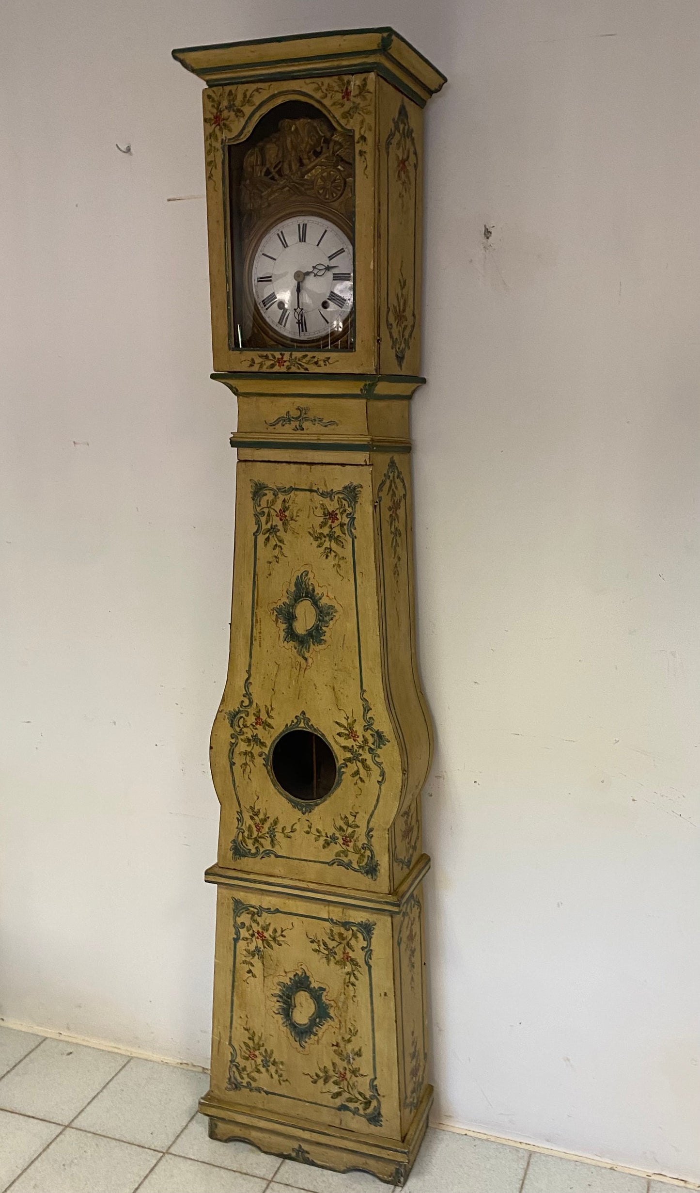 Lacquered and painted pendulum clock. 19th century