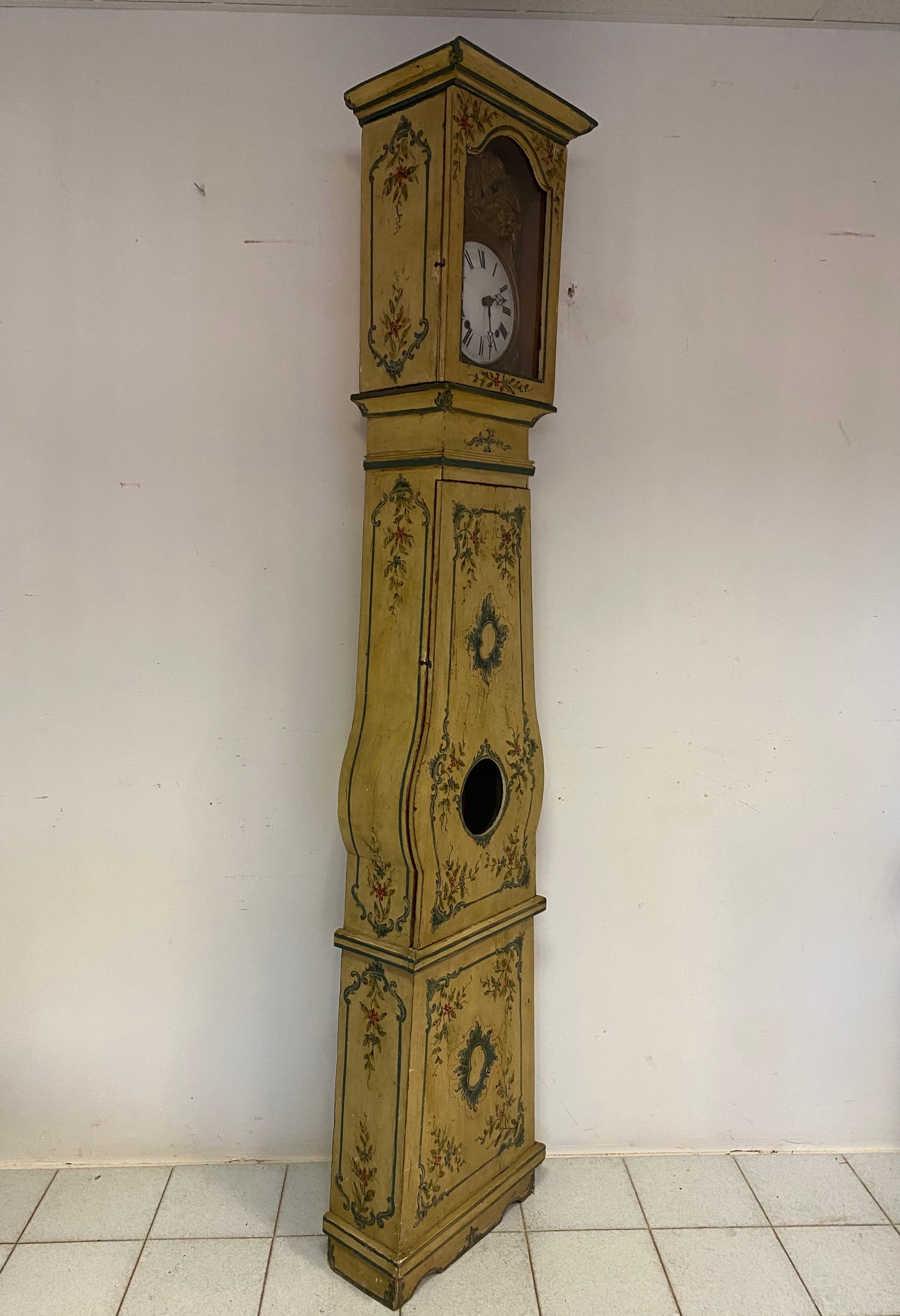 Lacquered and painted pendulum clock. 19th century