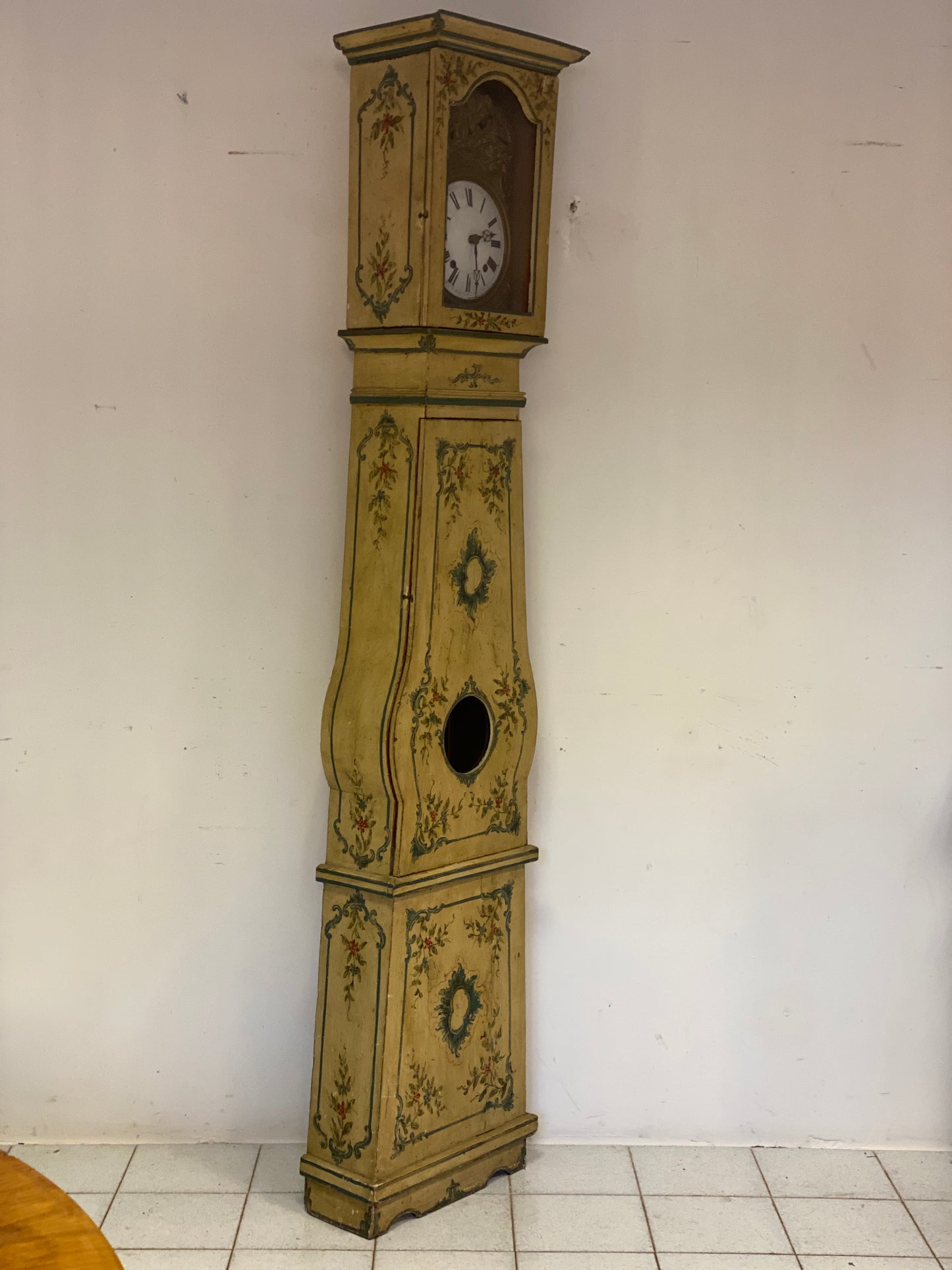 Lacquered and painted pendulum clock. 19th century