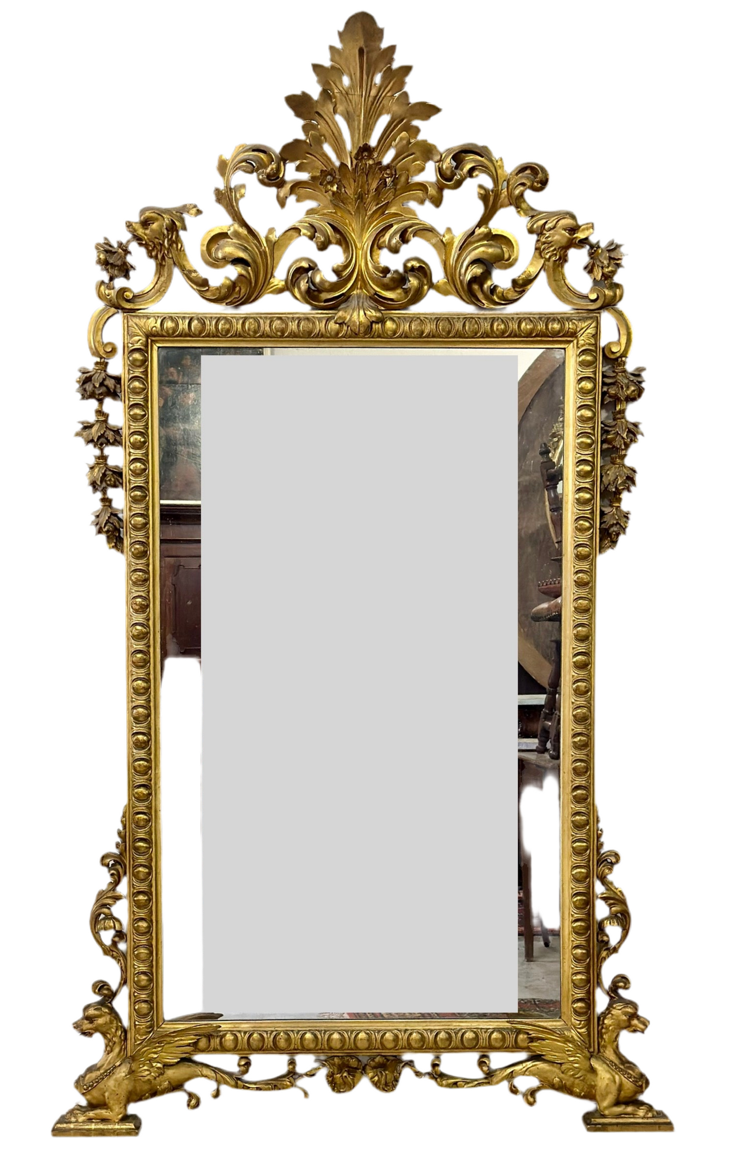Carved gilded wooden mirror. Tuscany, early 19th century