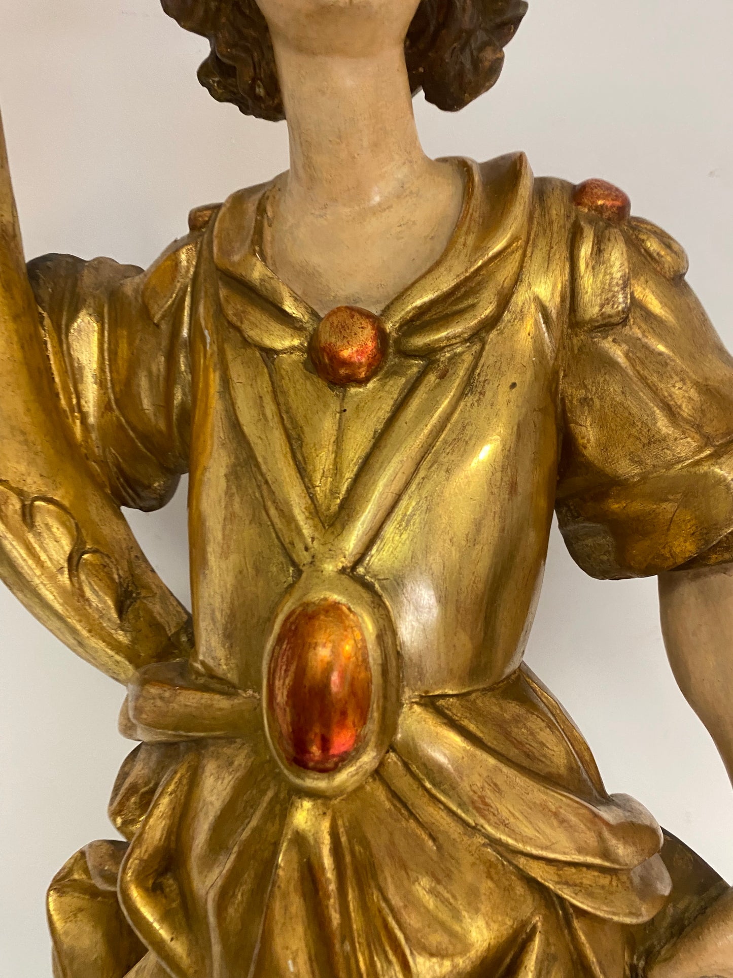 Angel candle holder lacquered gold in carved wood. Central Italy first half of the 17th century. Height 124 cm