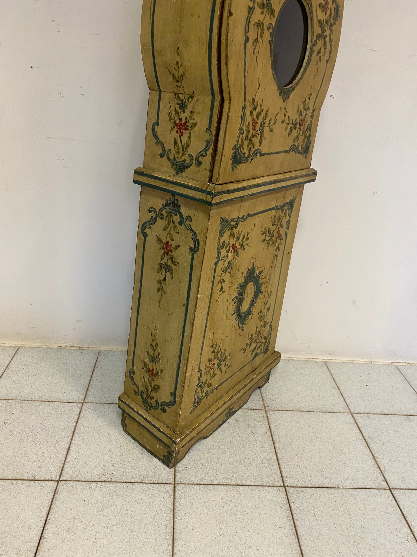 Lacquered and painted pendulum clock. 19th century