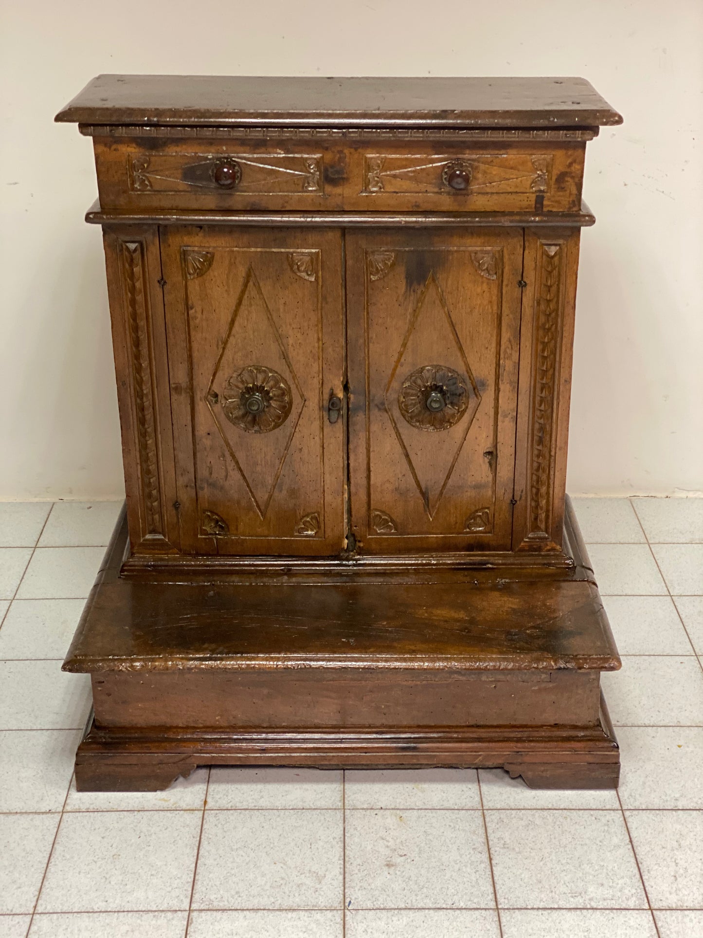Louis XIV carved kneeler, Lombardy, 17th century.