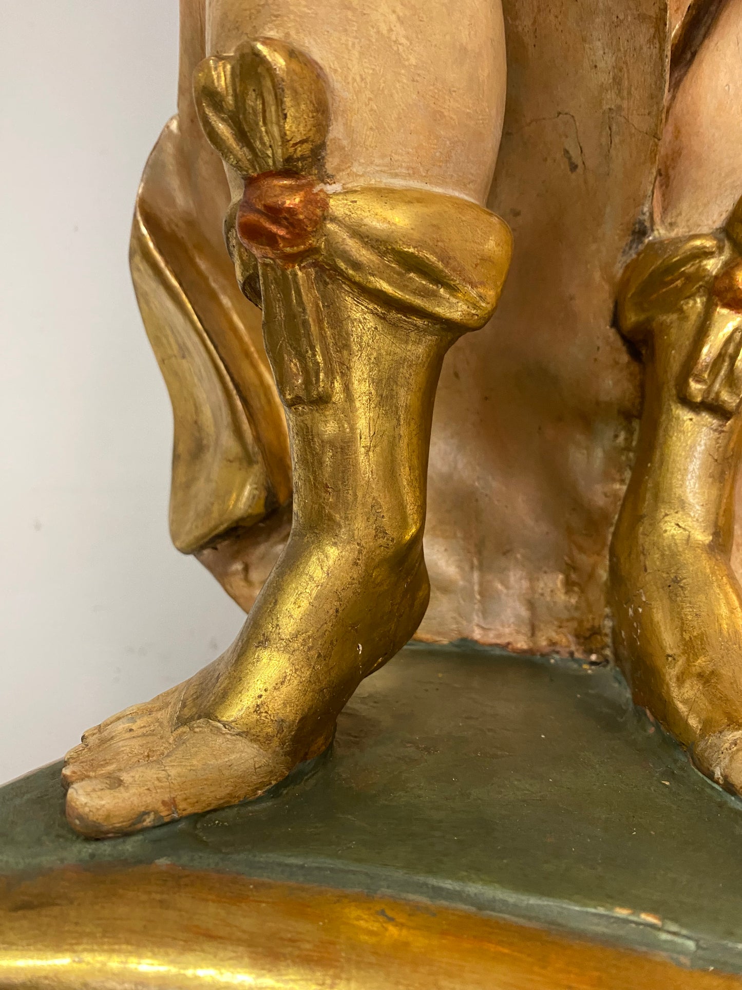 Angel candle holder lacquered gold in carved wood. Central Italy first half of the 17th century. Height 124 cm