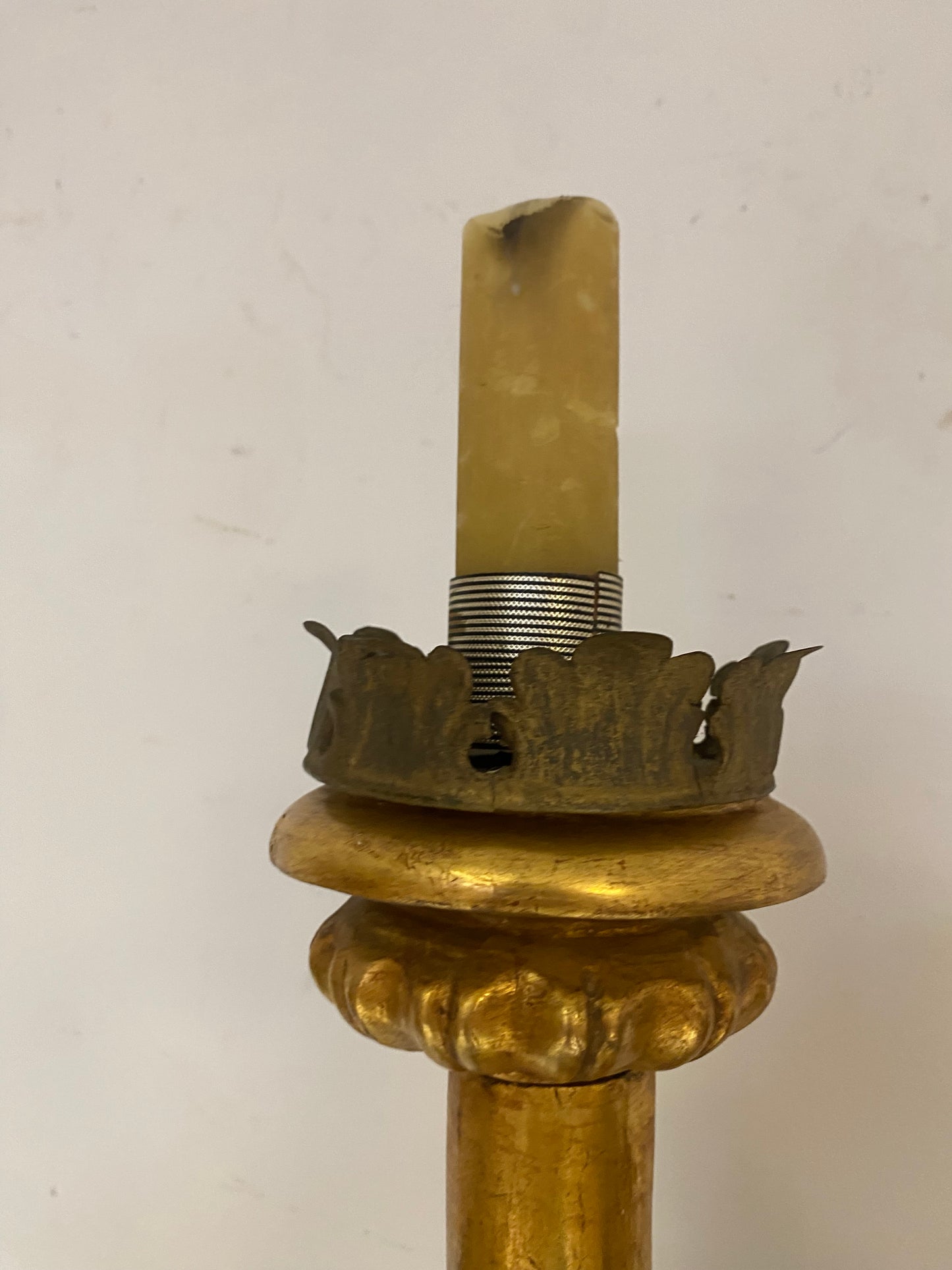 Angel candle holder lacquered gold in carved wood. Central Italy first half of the 17th century. Height 124 cm