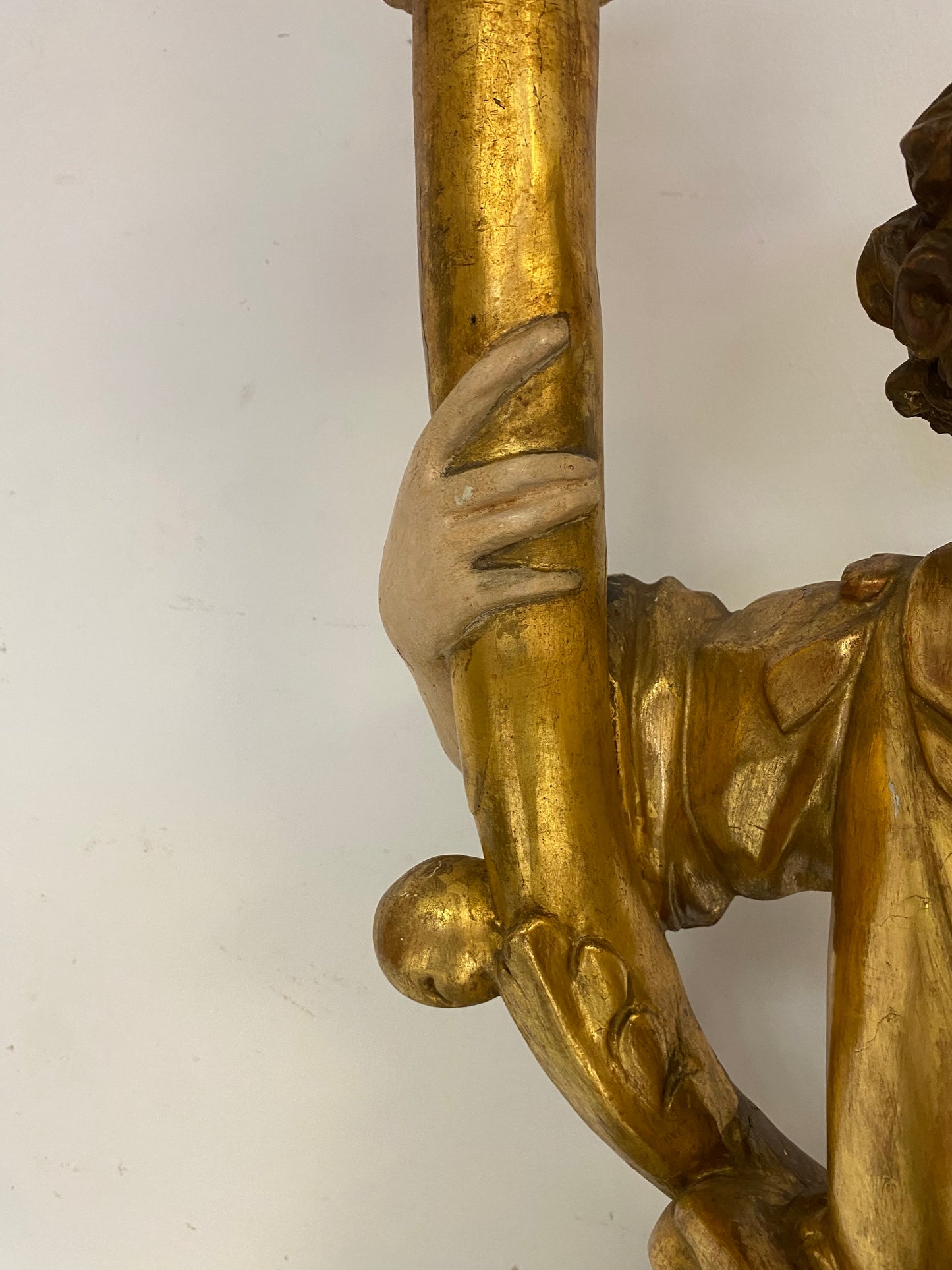 Angel candle holder lacquered gold in carved wood. Central Italy first half of the 17th century. Height 124 cm