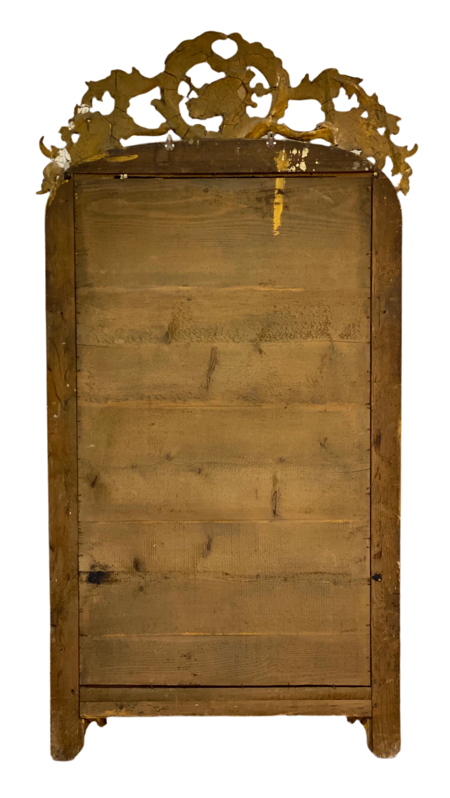 Charles X mirror, gilded carved wood, 19th century.