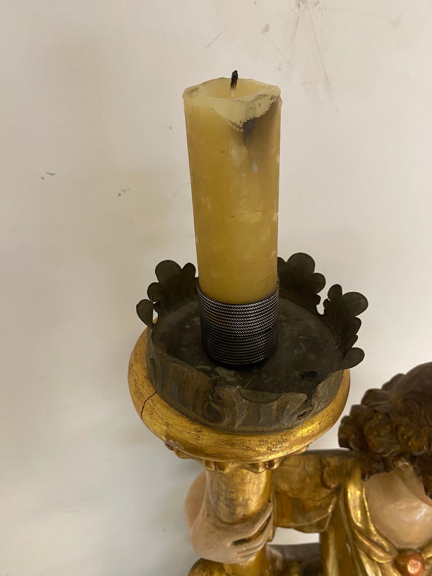 Angel candle holder lacquered gold in carved wood. Central Italy first half of the 17th century. Height 124 cm
