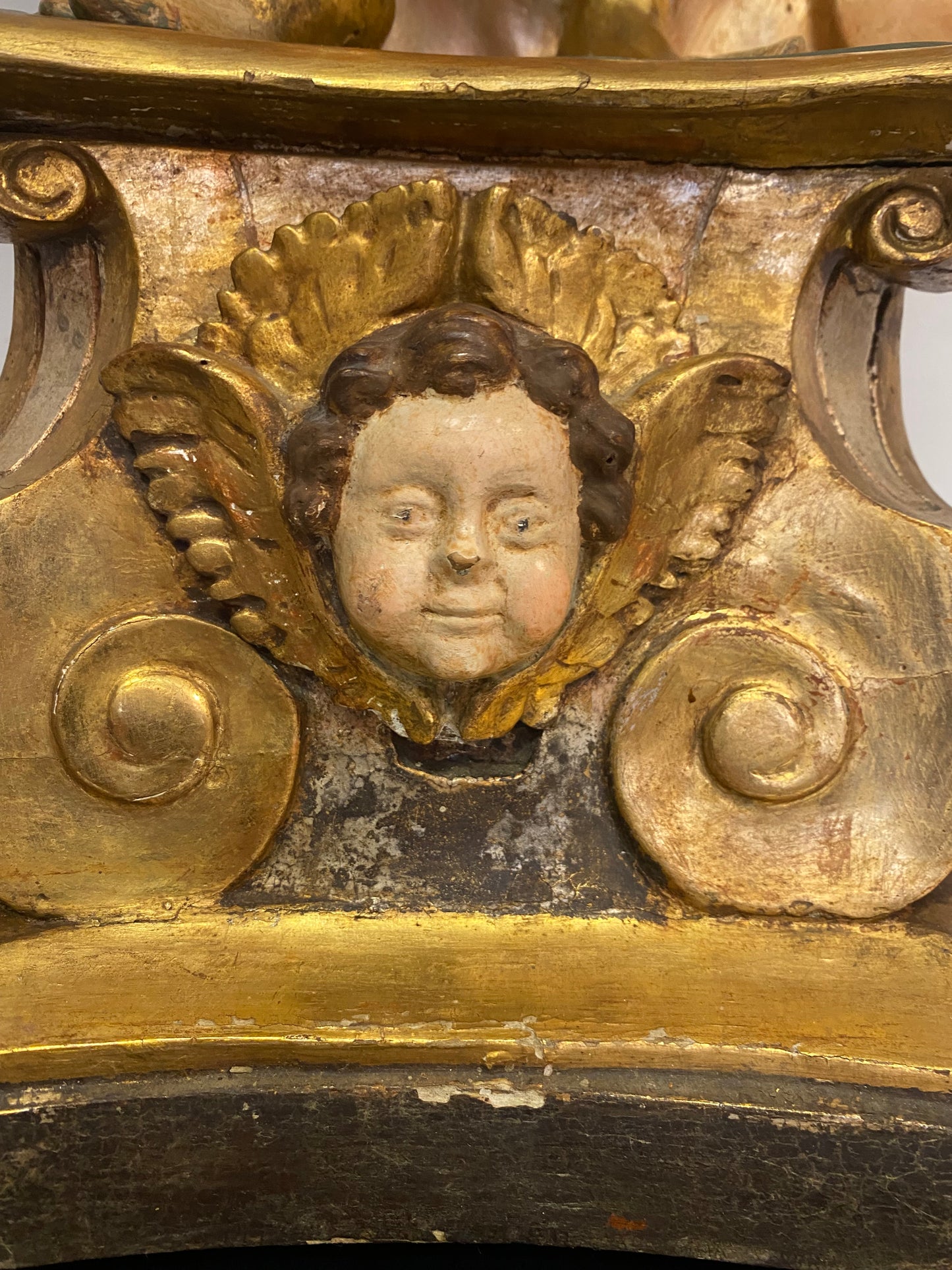 Angel candle holder lacquered gold in carved wood. Central Italy first half of the 17th century. Height 124 cm