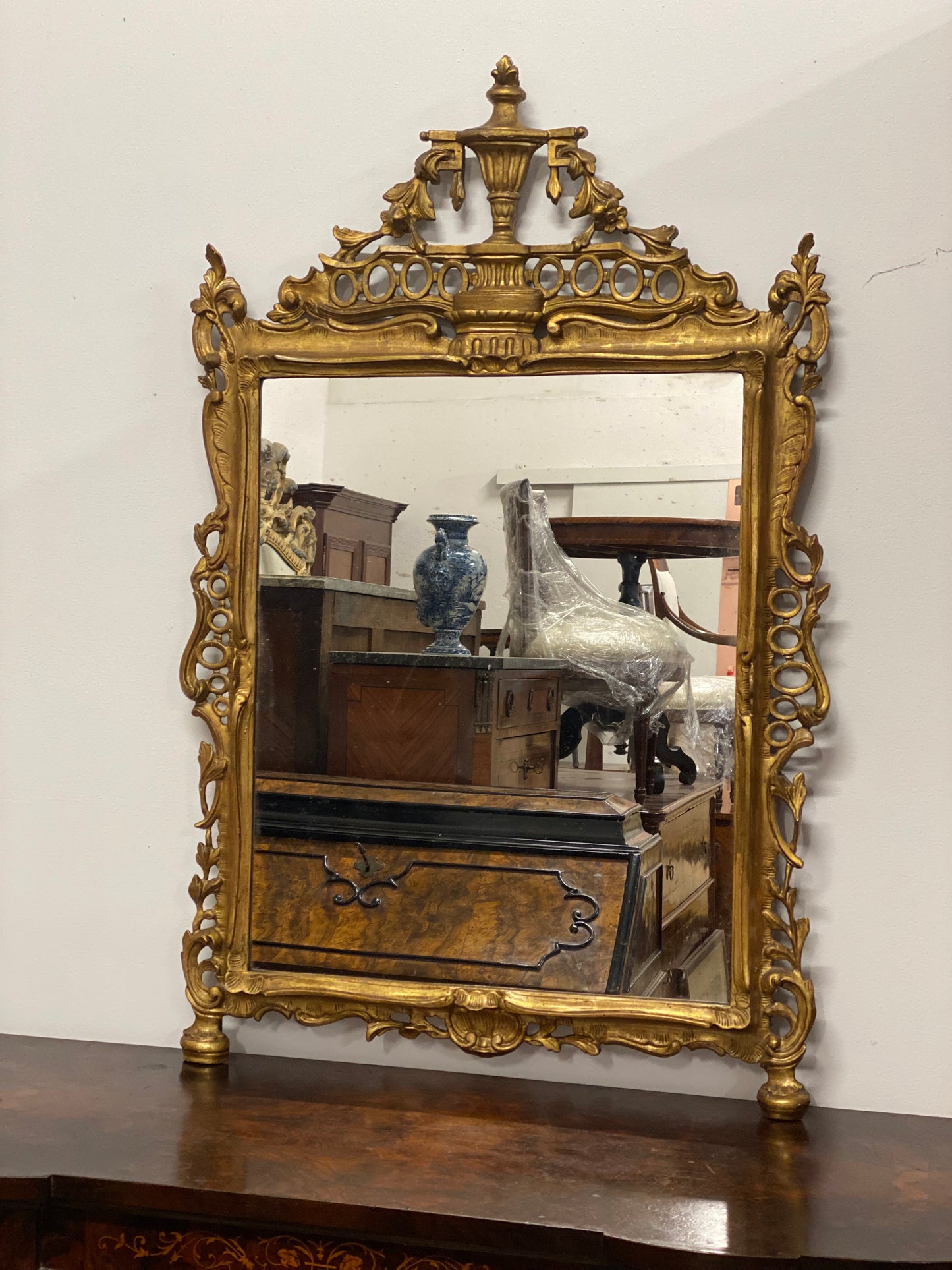 Specchiera lombarda impero in legno intagliato, dorato XIX secolo