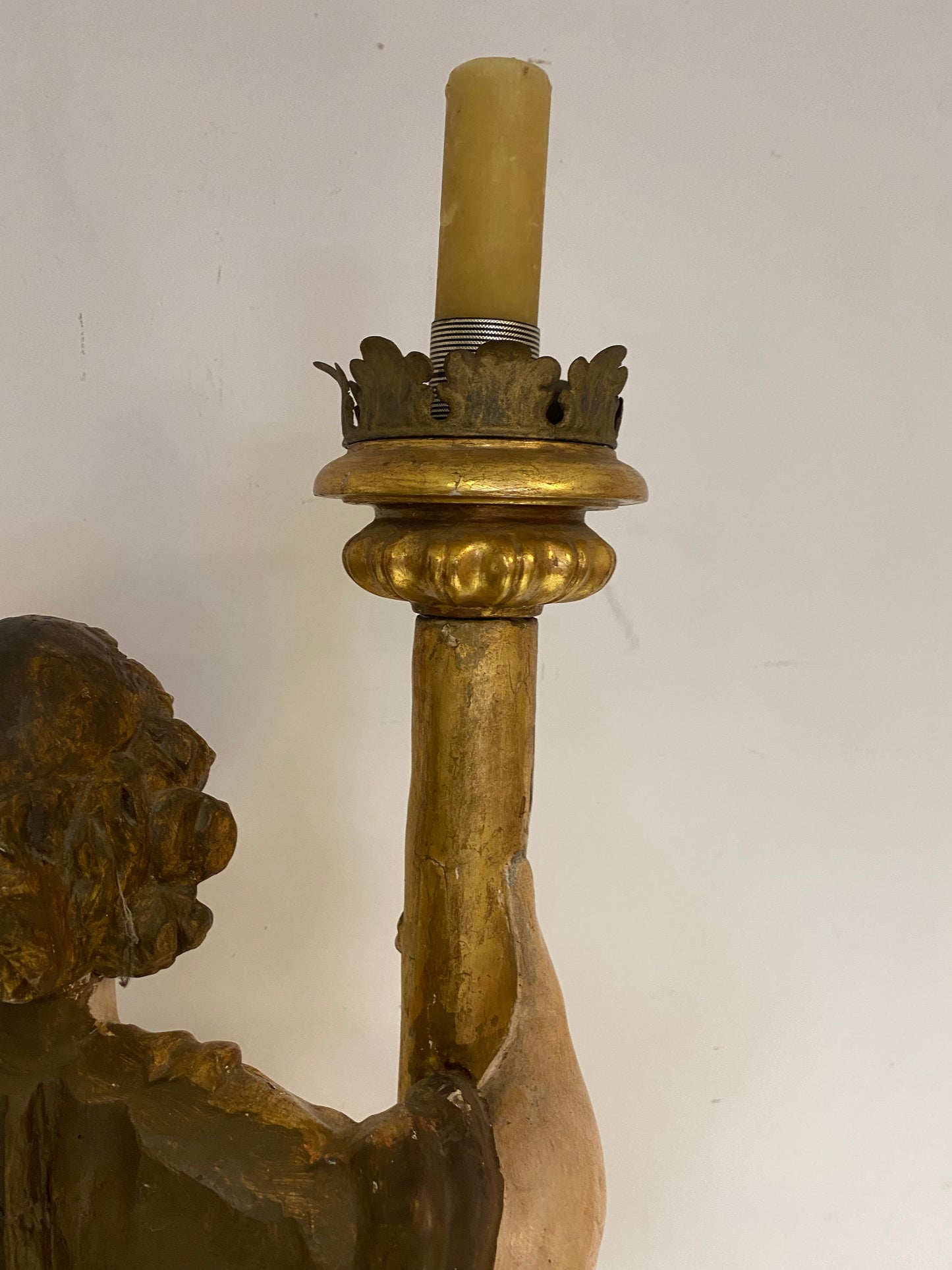 Angel candle holder lacquered gold in carved wood. Central Italy first half of the 17th century. Height 124 cm