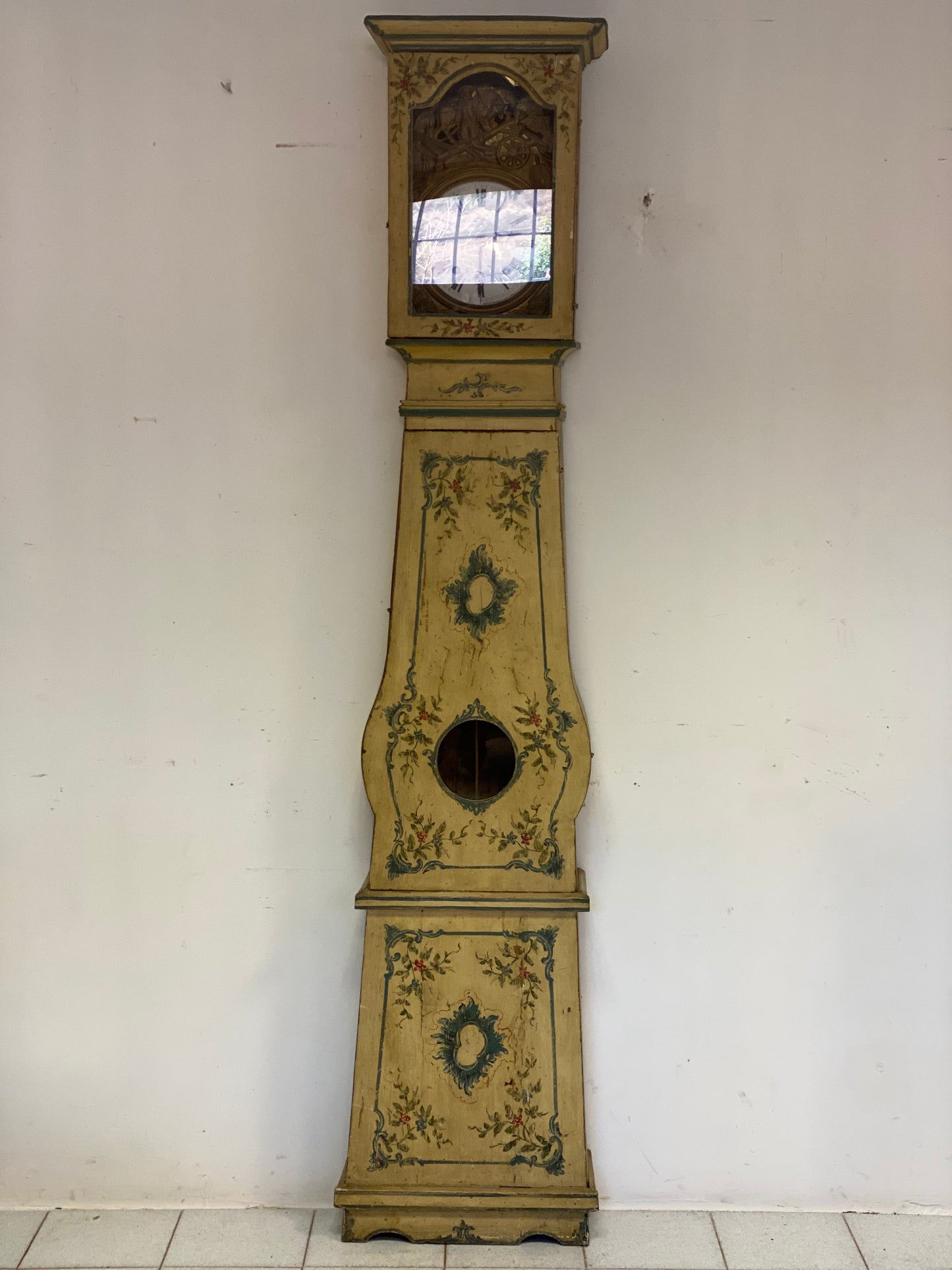 Lacquered and painted pendulum clock. 19th century