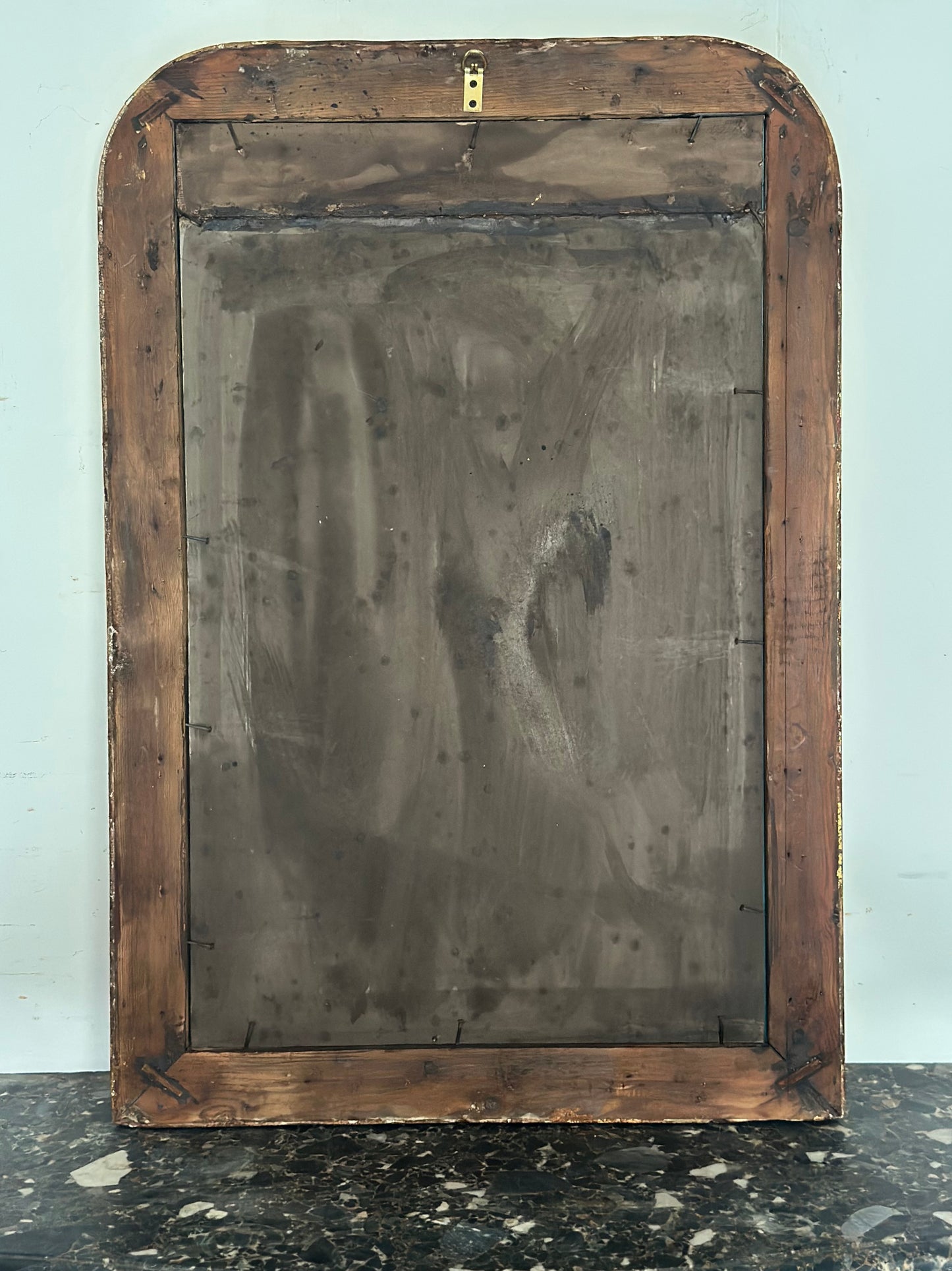 Specchiera della seconda metà dell’800 in legno dorato Forma rettangolare con angoli stondati