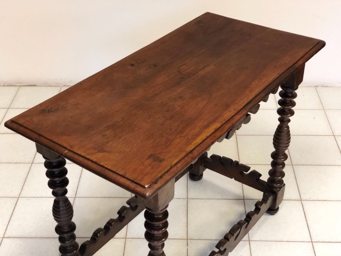 Walnut reel table. 18th century