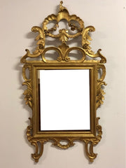 Specchiera lombarda in legno intagliato e dorato periodo impero
