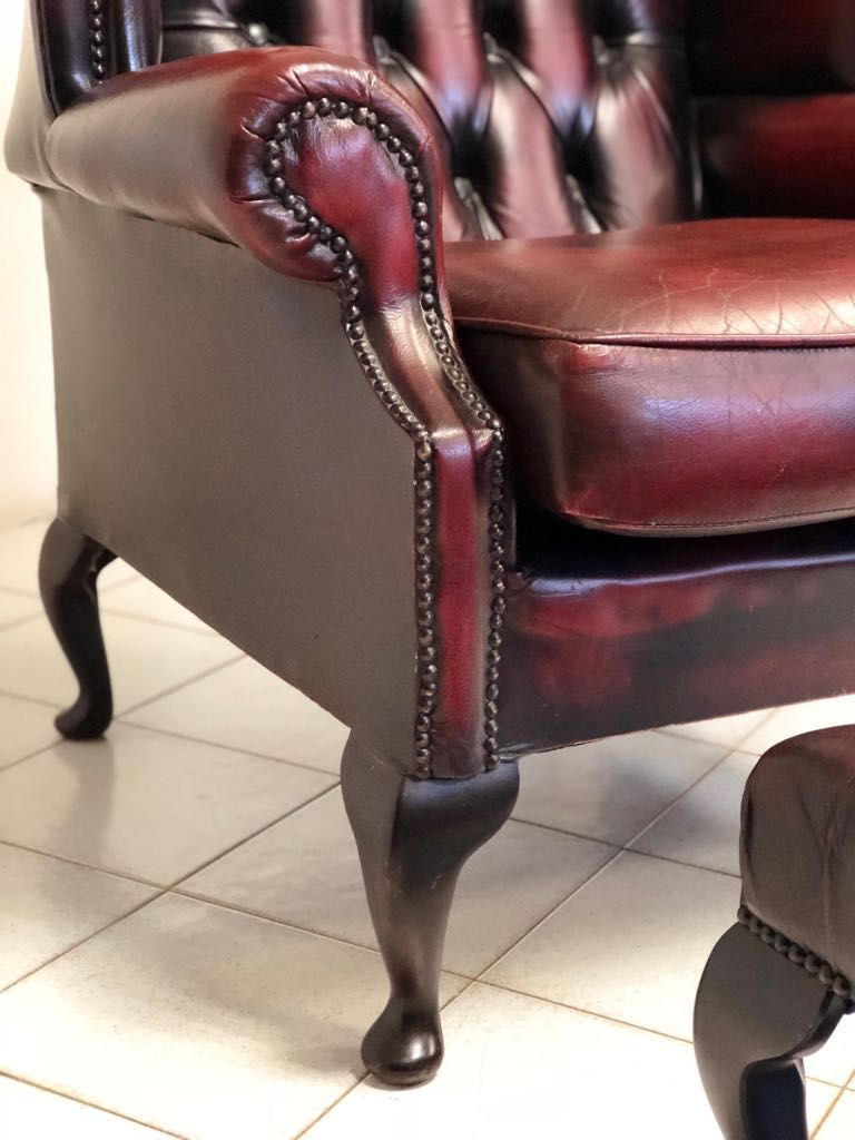 English leather armchair bergère model with pouf