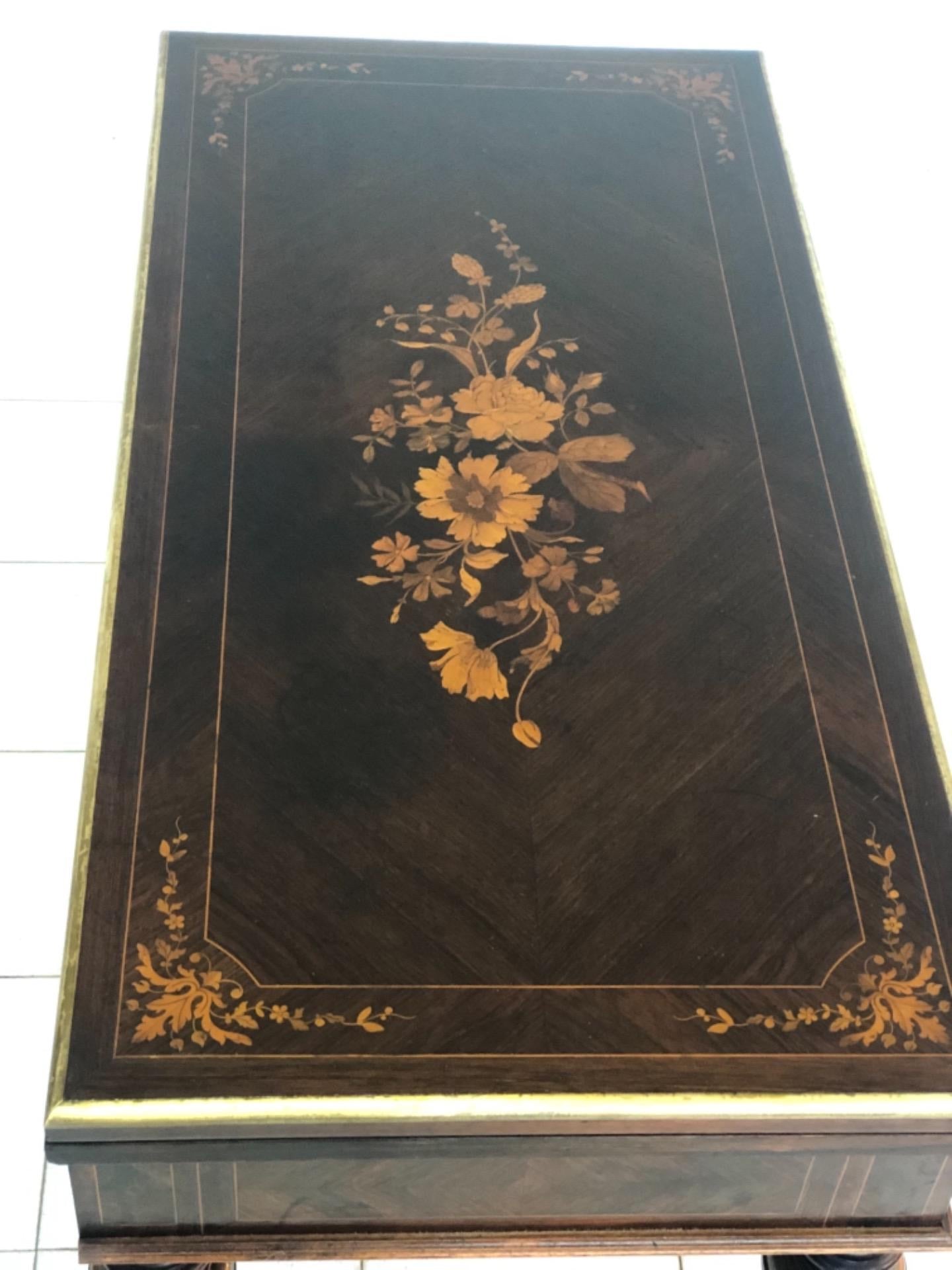 Inlaid veneered table. 19th century