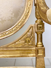 Divano intagliato e dorato in foglia oro . Inizio XIX secolo
