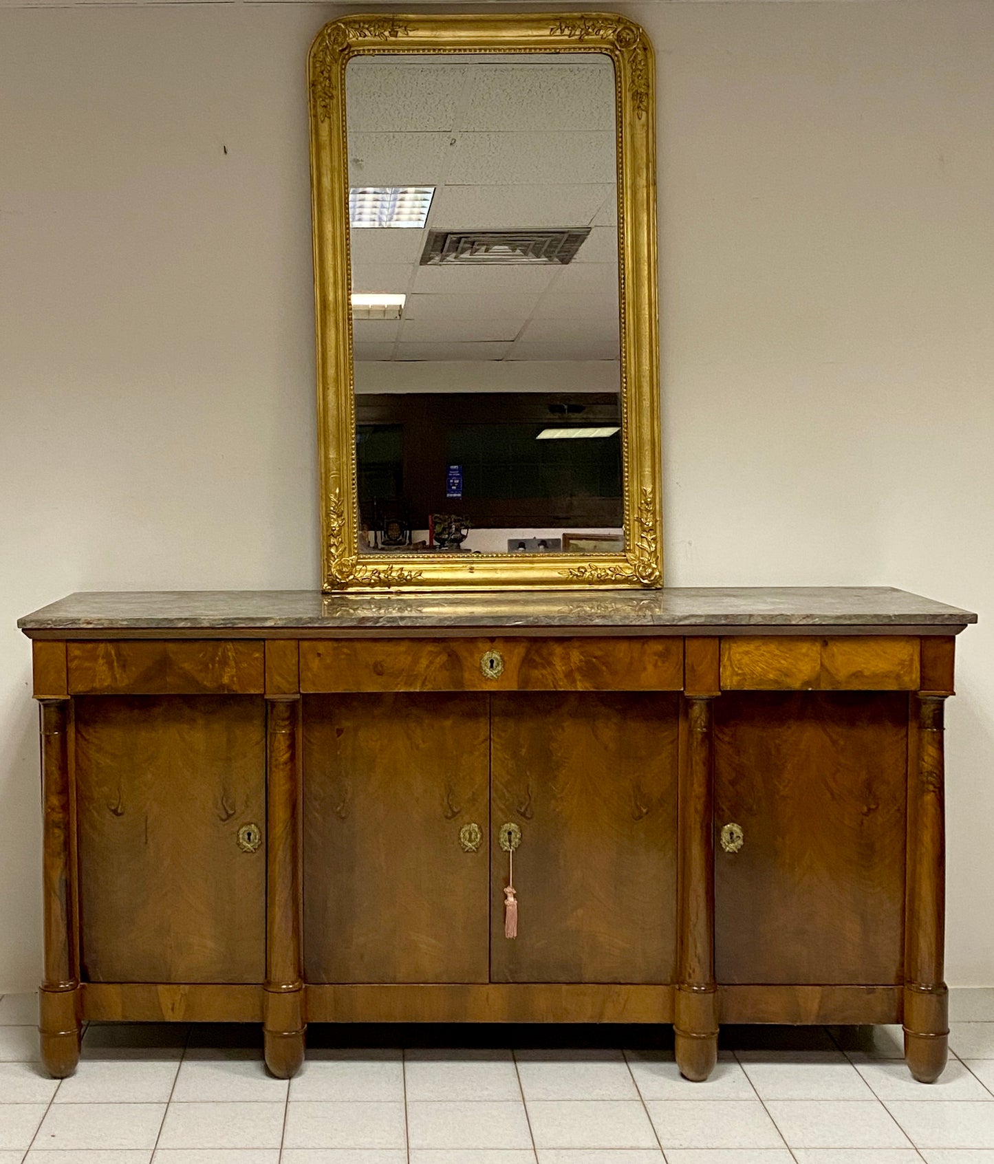 Wooden mirror in gold leaf. Mid 19th century
