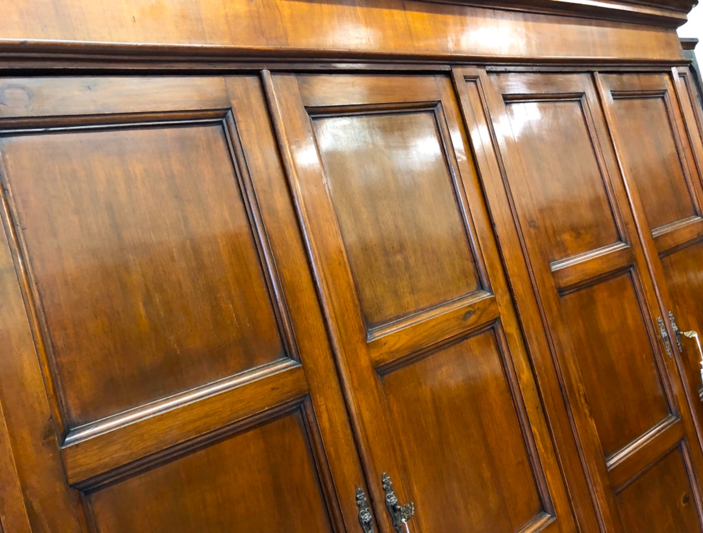 Lombard Charles X wardrobe, four doors, walnut. 19th century