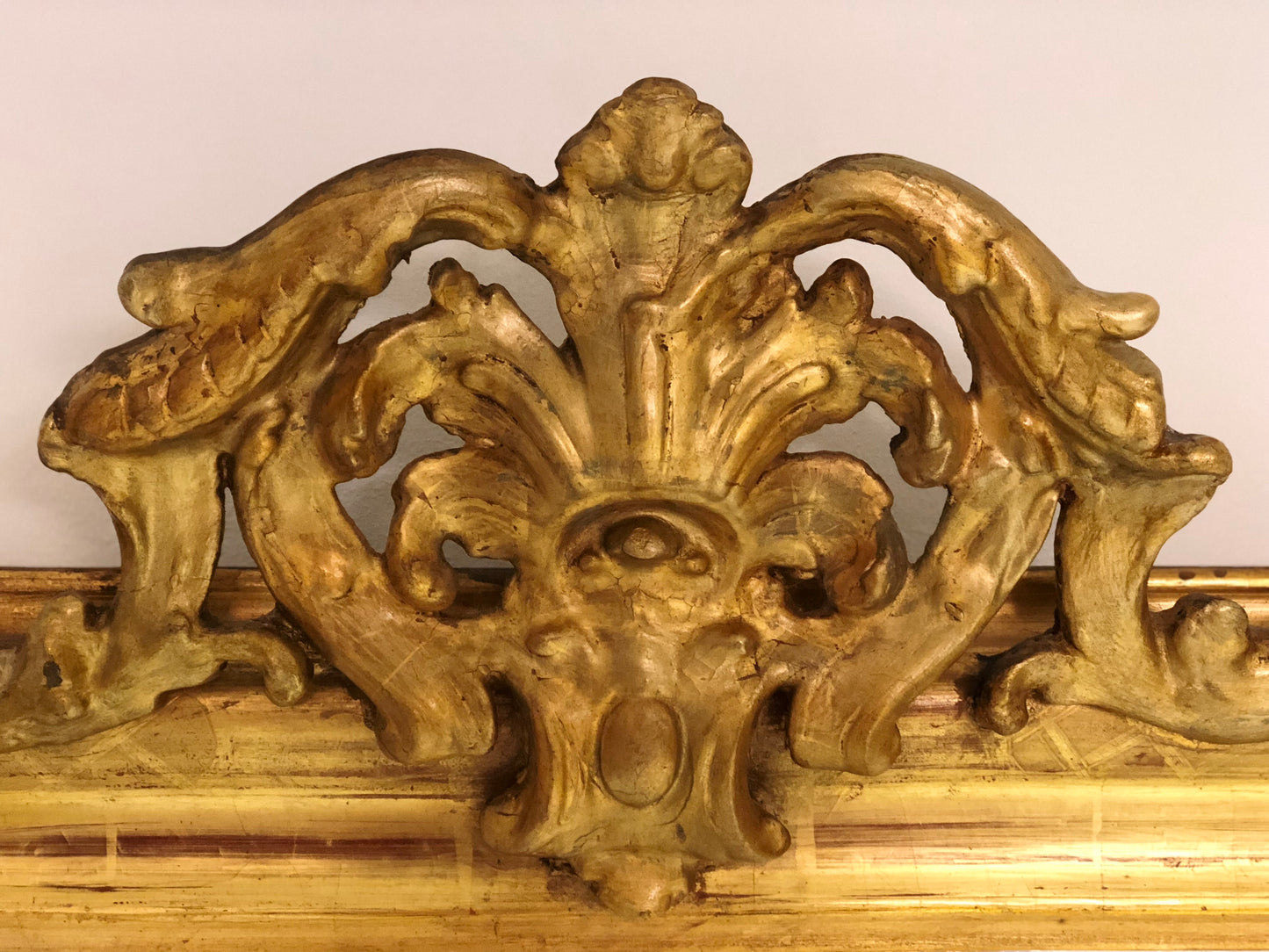 Mirror in pure gold leaf with perforated top