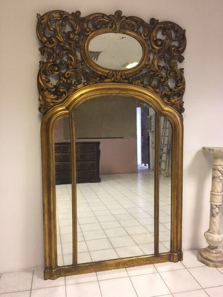Specchiera in legno intagliata e dorata
