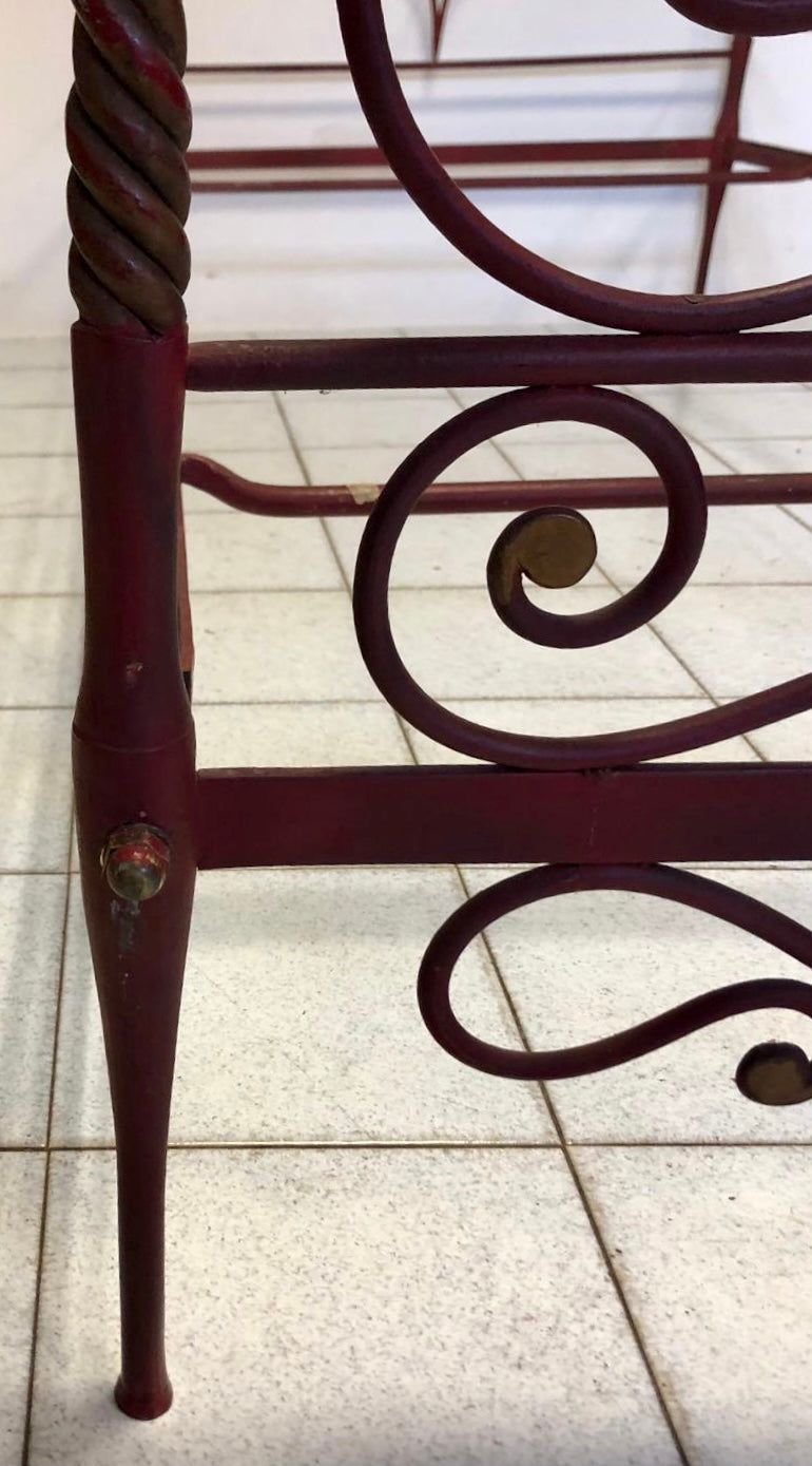 Wrought iron and lacquered and gilded bronze bed. Siena, early 19th century
