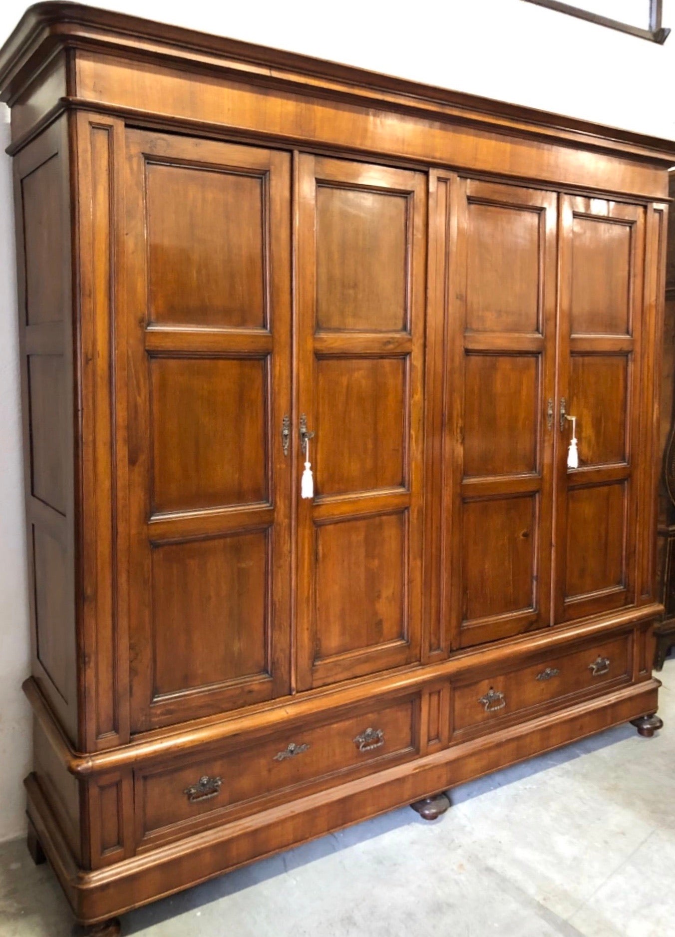 Lombard Charles X wardrobe, four doors, walnut. 19th century