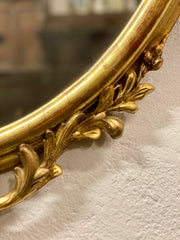 Specchiera ovale in foglia oro . Lombardia XIX secolo
