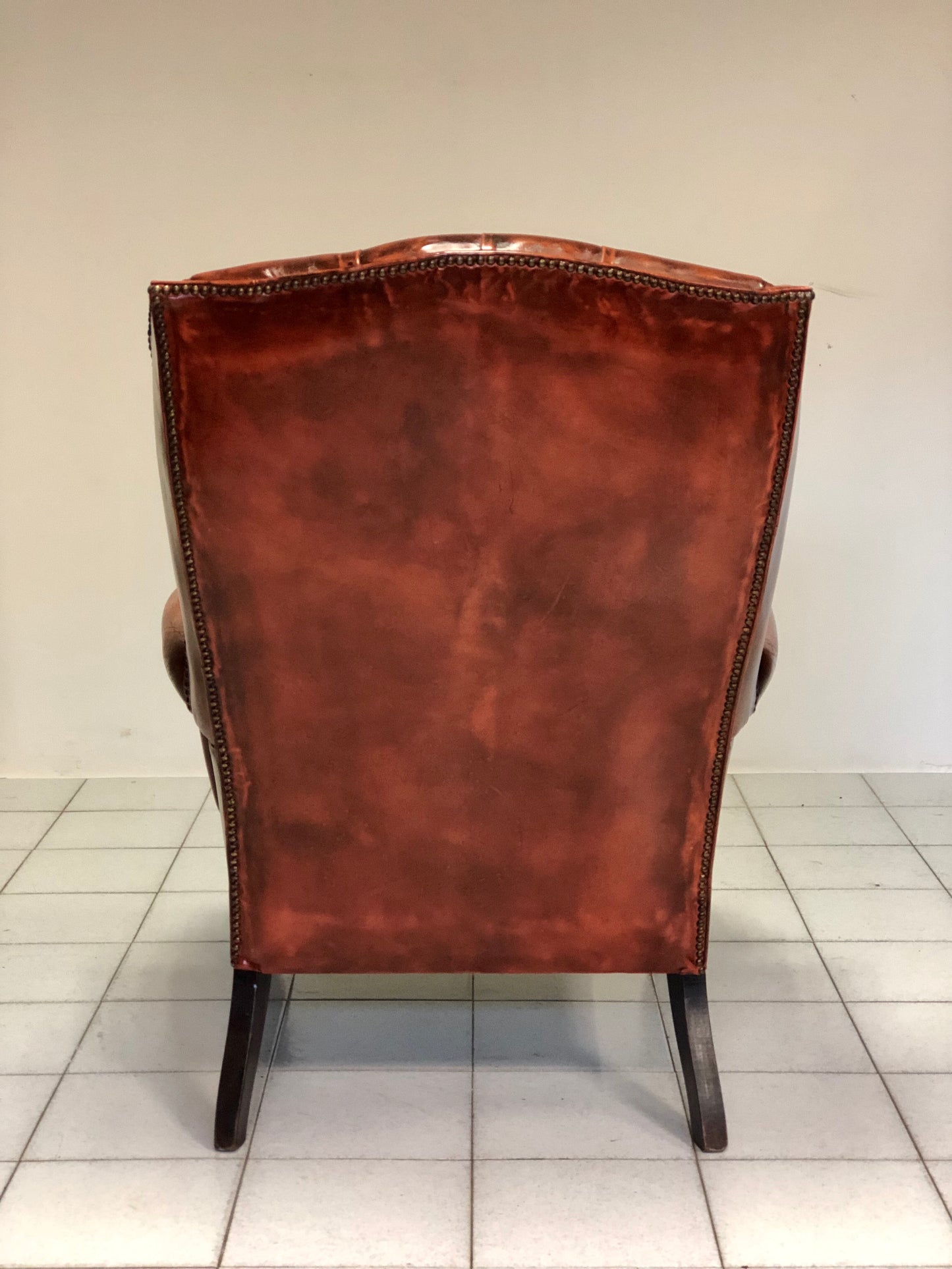 Chesterfield bergère leather armchair. England 60s