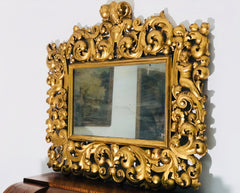 Specchiera in legno intagliato e dorato . Modena Bologna primi 700