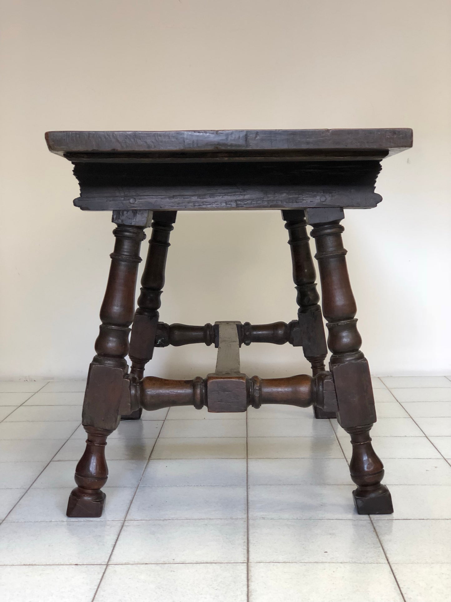 Walnut refectory table with spool. 17th century