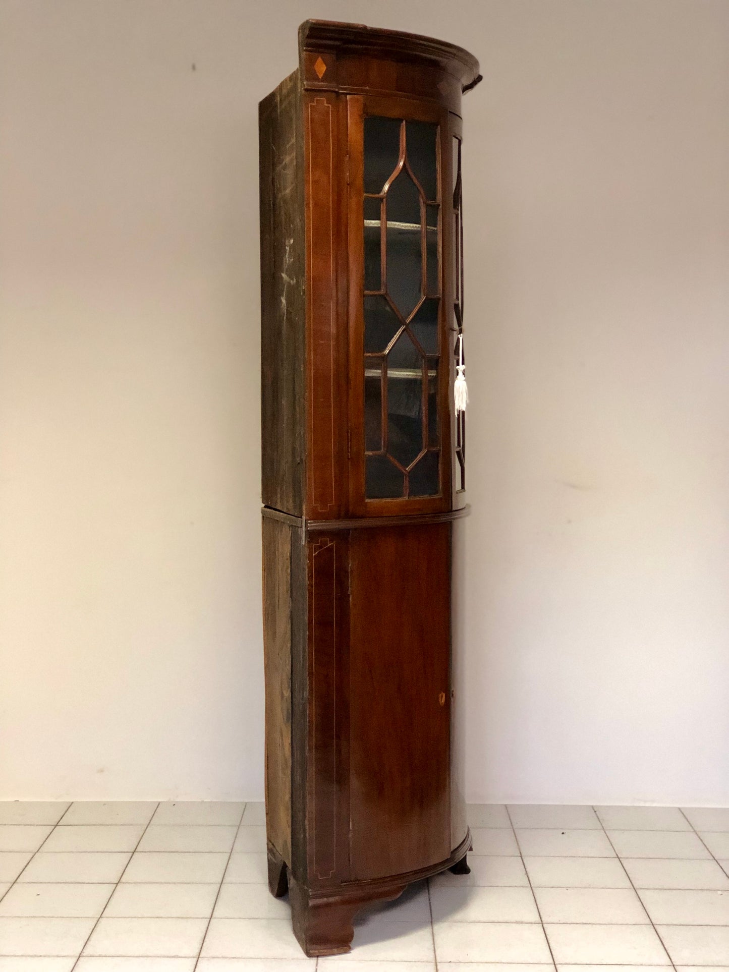 Inlaid curved corner cabinet, mid 19th century