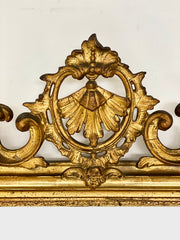 Specchiera Luigi Filippo lombarda in legno dorato e intagliato . XIX secolo