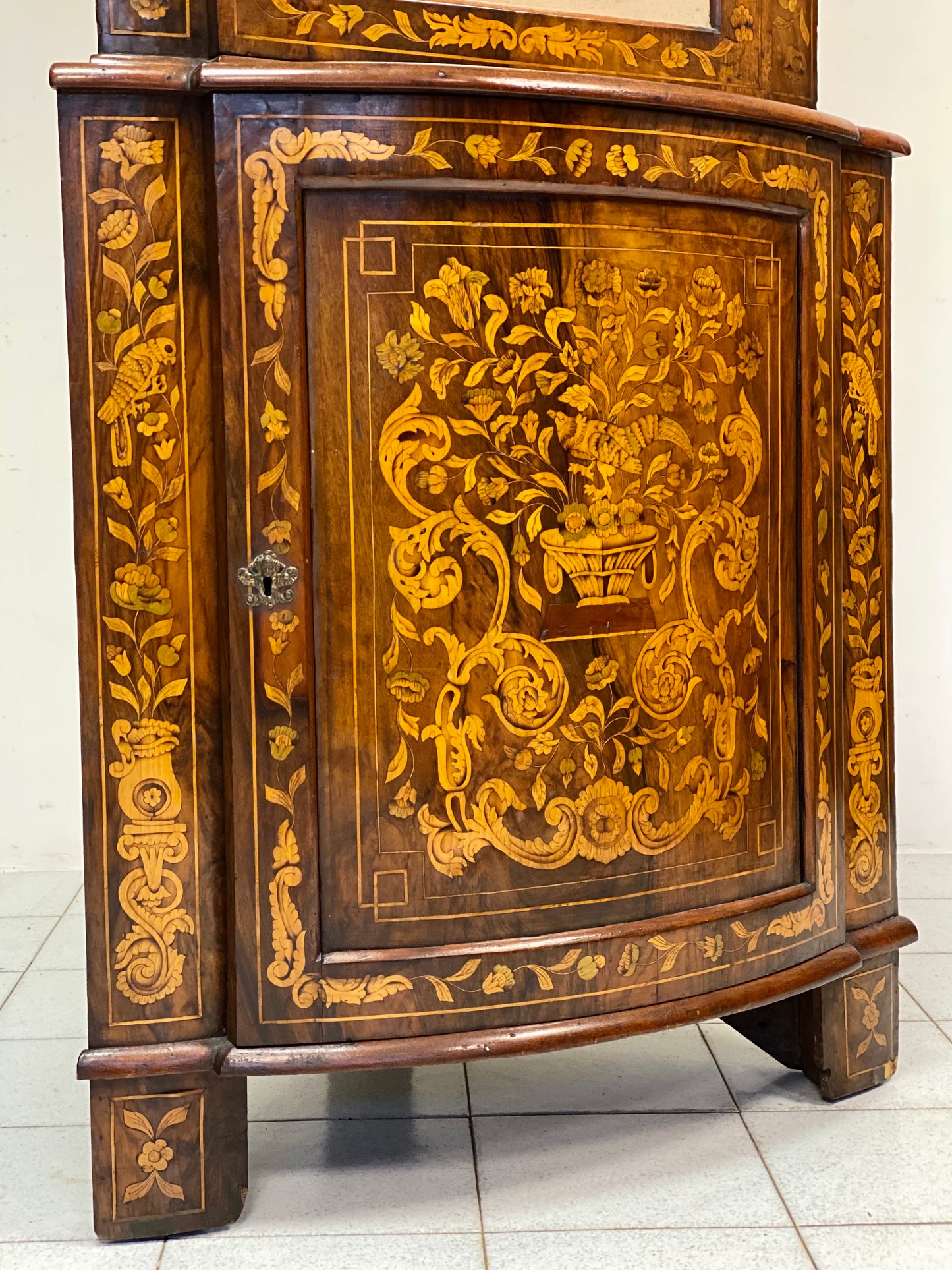 Dutch inlaid corner cupboard. Early 19th century