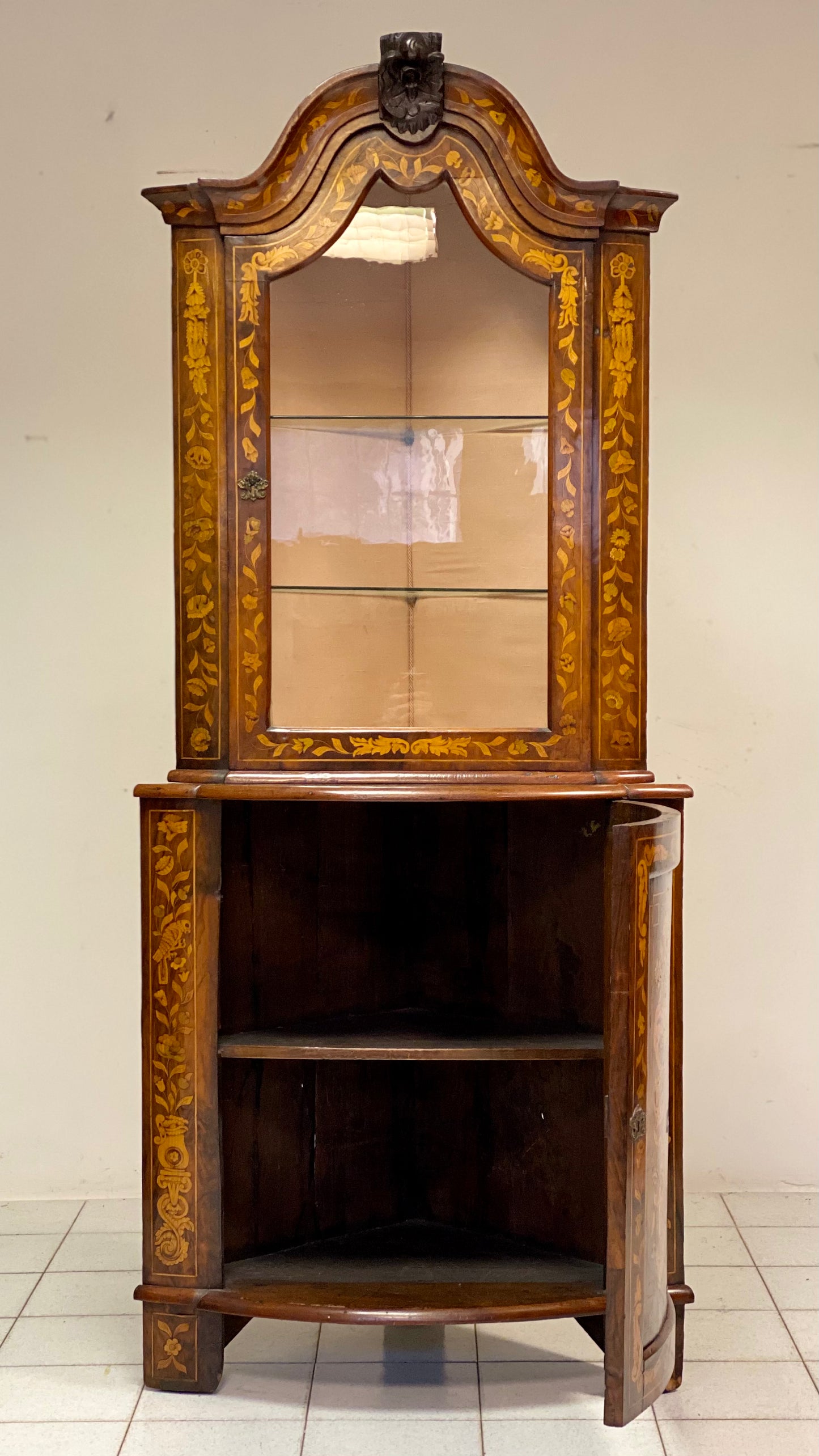 Dutch inlaid corner cupboard. Early 19th century