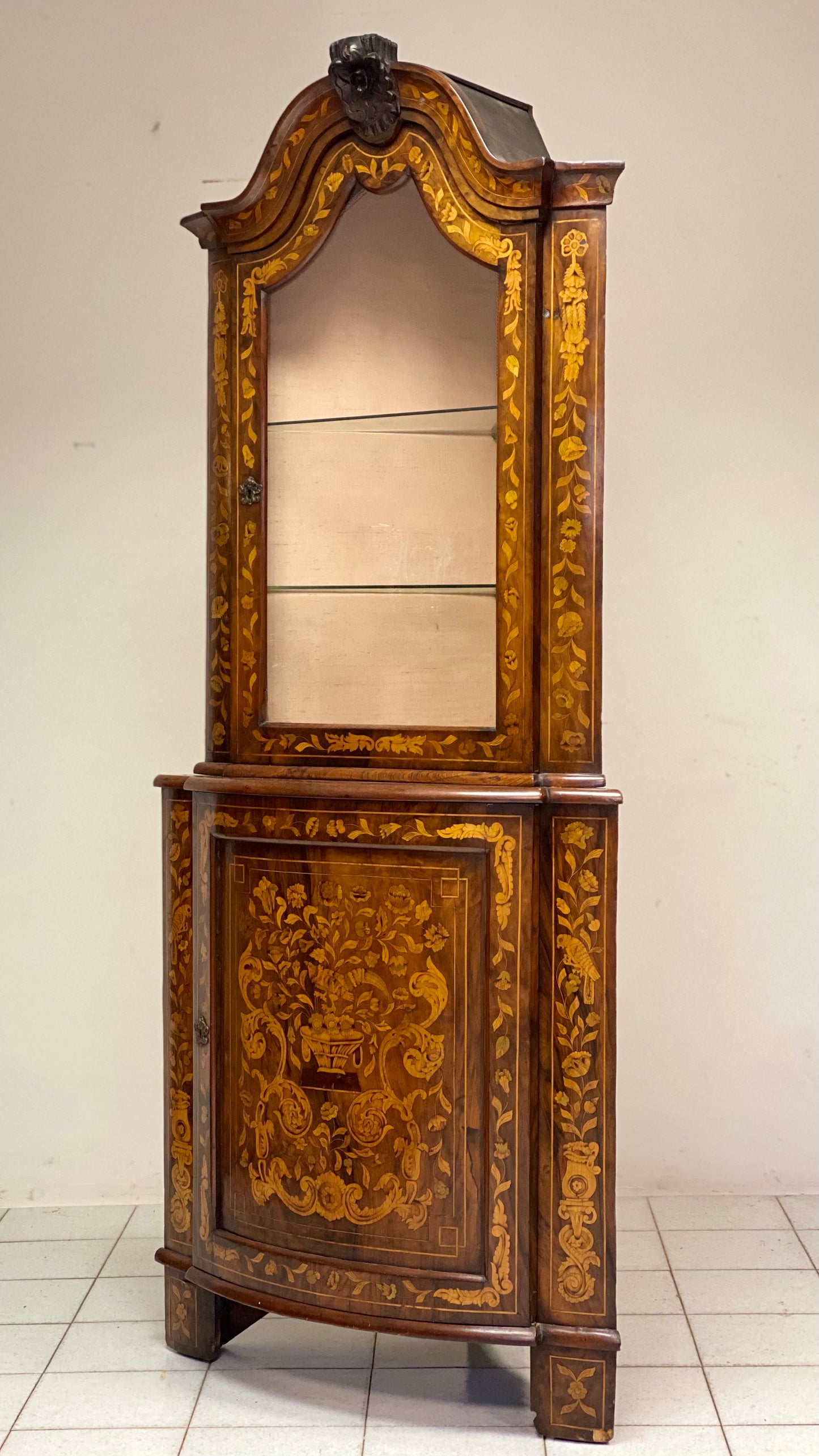 Dutch inlaid corner cupboard. Early 19th century