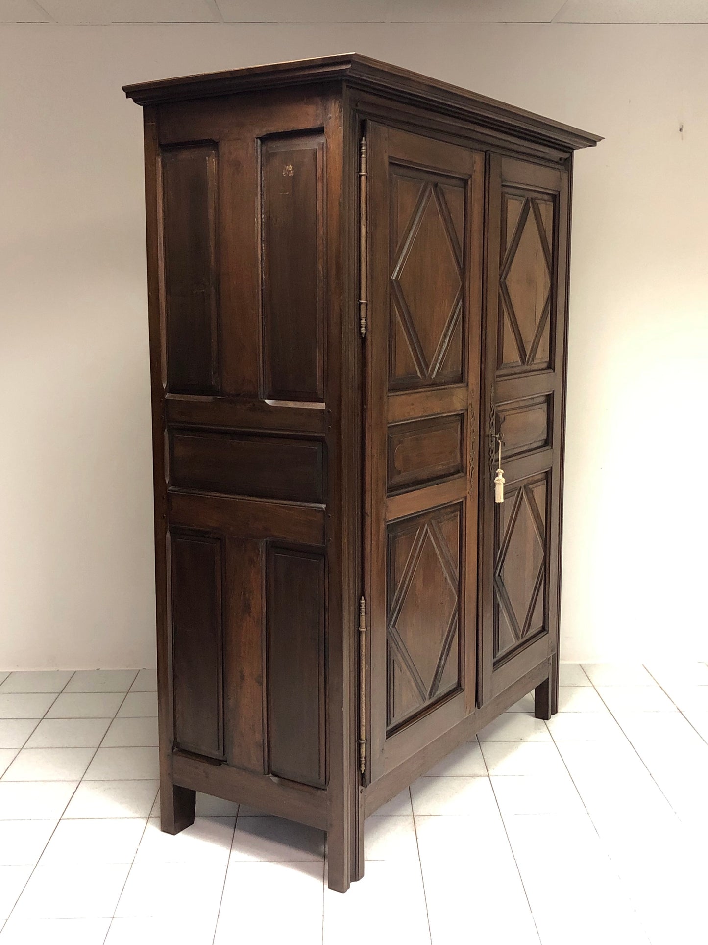 Diamond-point walnut wardrobe. 18th century