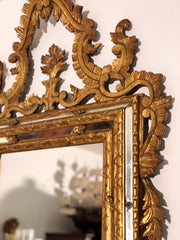 Specchiera in legno intagliato e dorato. Venezia XIX secolo