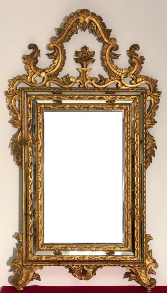 Specchiera in legno intagliato e dorato. Venezia XIX secolo