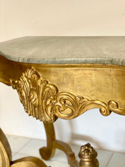 Console lombarda sagomata in legno intagliato e dorato. XIX secolo