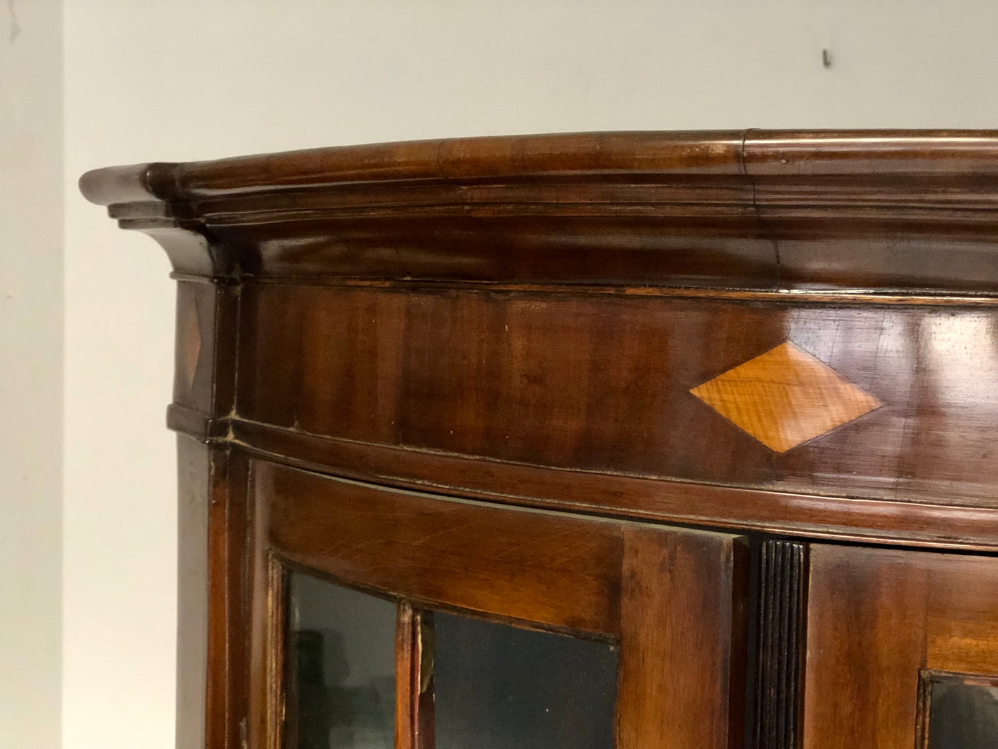 Inlaid curved corner cabinet, mid 19th century
