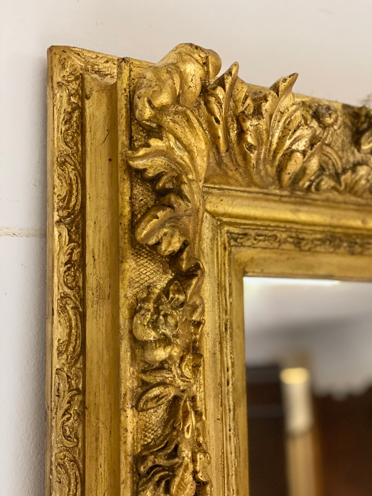 Carved and gilded wooden mirror. Lombardy 19th century