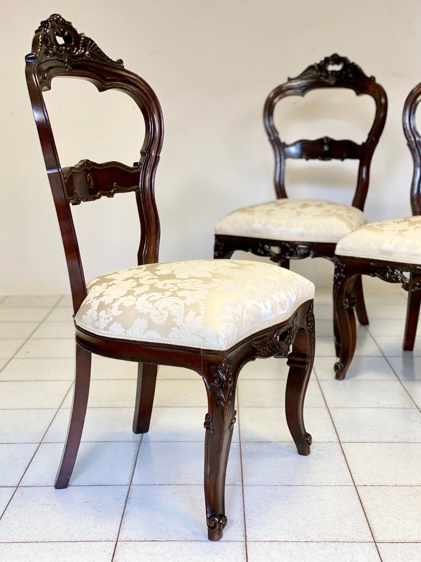 Four Louis Philippe walnut chairs. Restored