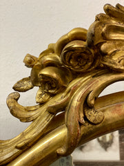 Specchiera ovale in foglia oro . Lombardia XIX secolo