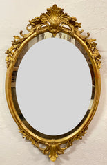 Specchiera ovale in foglia oro . Lombardia XIX secolo