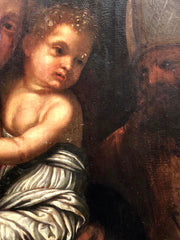 Olio su tavola Madonna con il bimbo e santo vescovo Lombardia XVI secolo