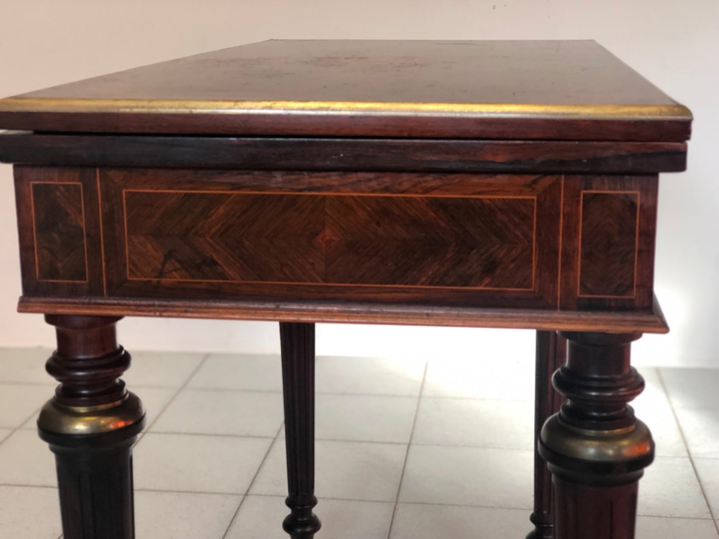 Inlaid veneered table. 19th century