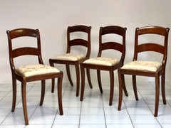 Gruppo di quattro sedie in noce emiliane Carlo X .