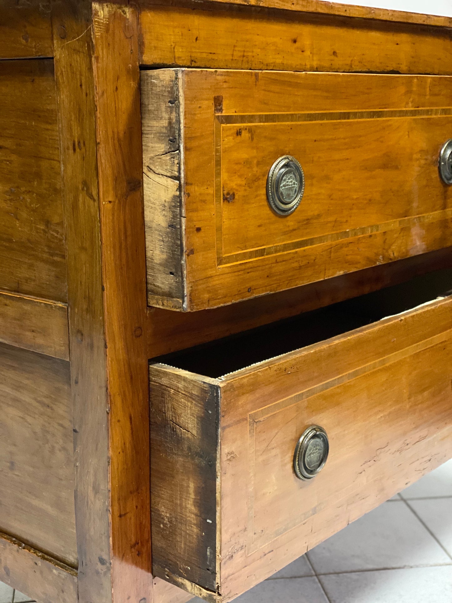 Inlaid cherry directorate chest of drawers. Lombardy, early 19th century